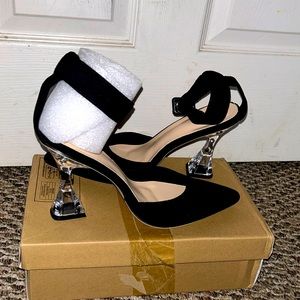 Brand new heels never used.